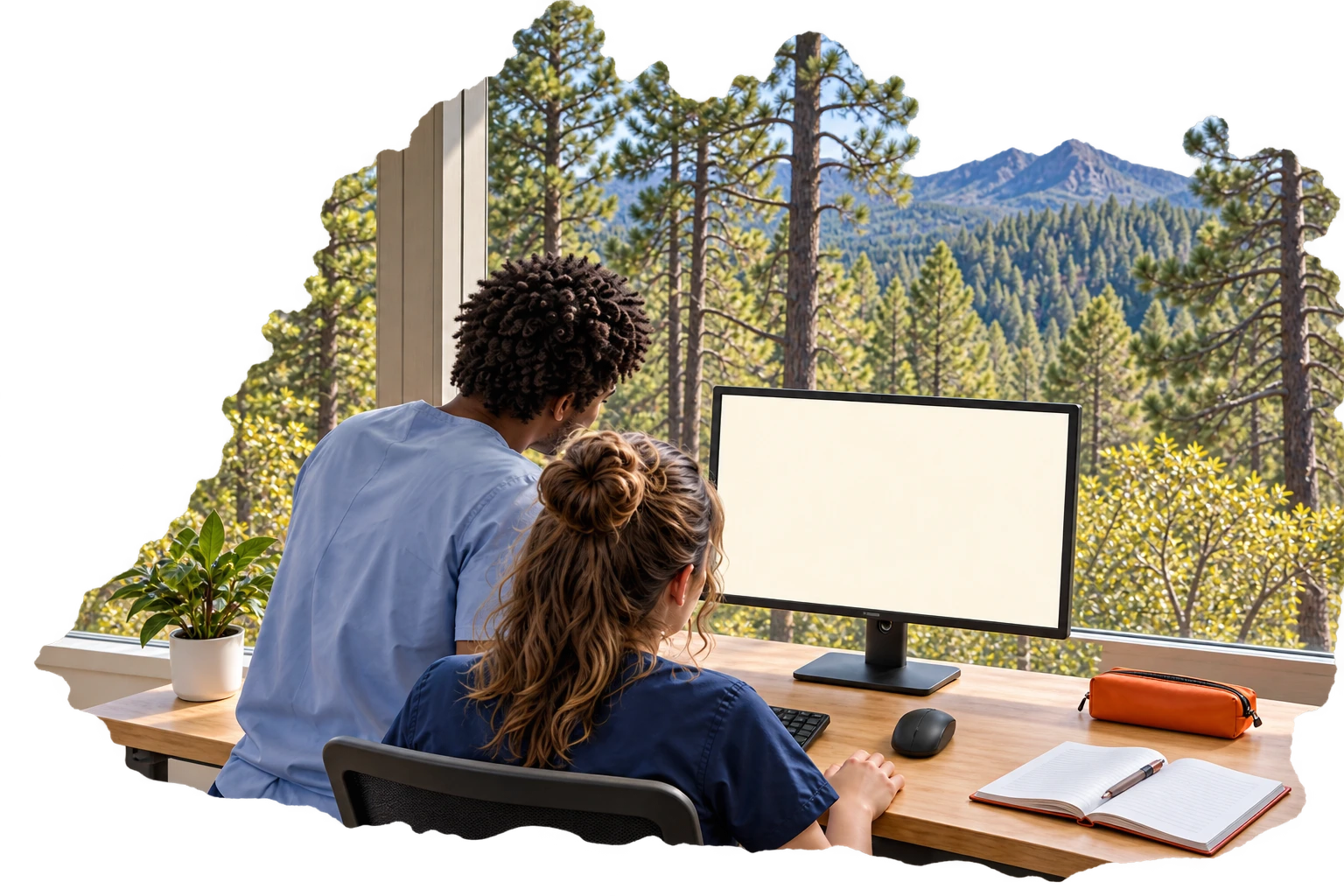 Two students reviewing a computer workstation overlooking Northern Arizona pine forest.